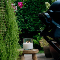 Citronella, Lavender & Rosemary soy candle outside