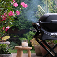 Citronella, Lavender & Rosemary soy candle outside