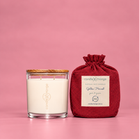 Pear & Guava 400g Soy Candle in a glass container with timber lid and red fabric gift bag