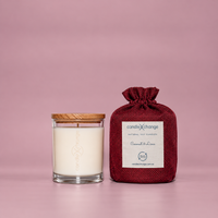 Coconut & Lime 300g Soy Candle in a glass container with timber lid and burgundy fabric gift bag