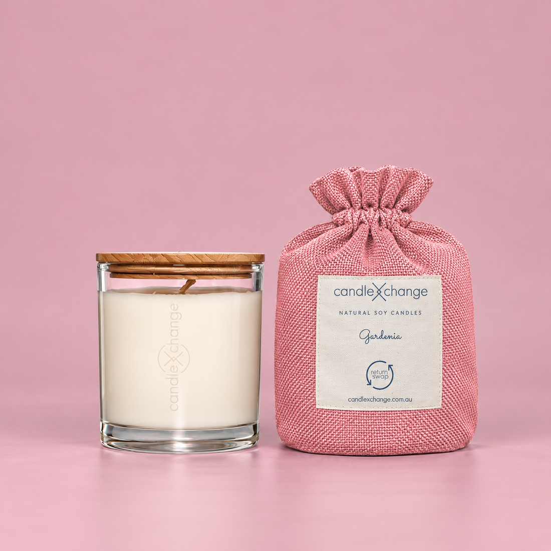 Gardenia 300g Soy Candle in a glass container with timber lid and dusty pink fabric gift bag