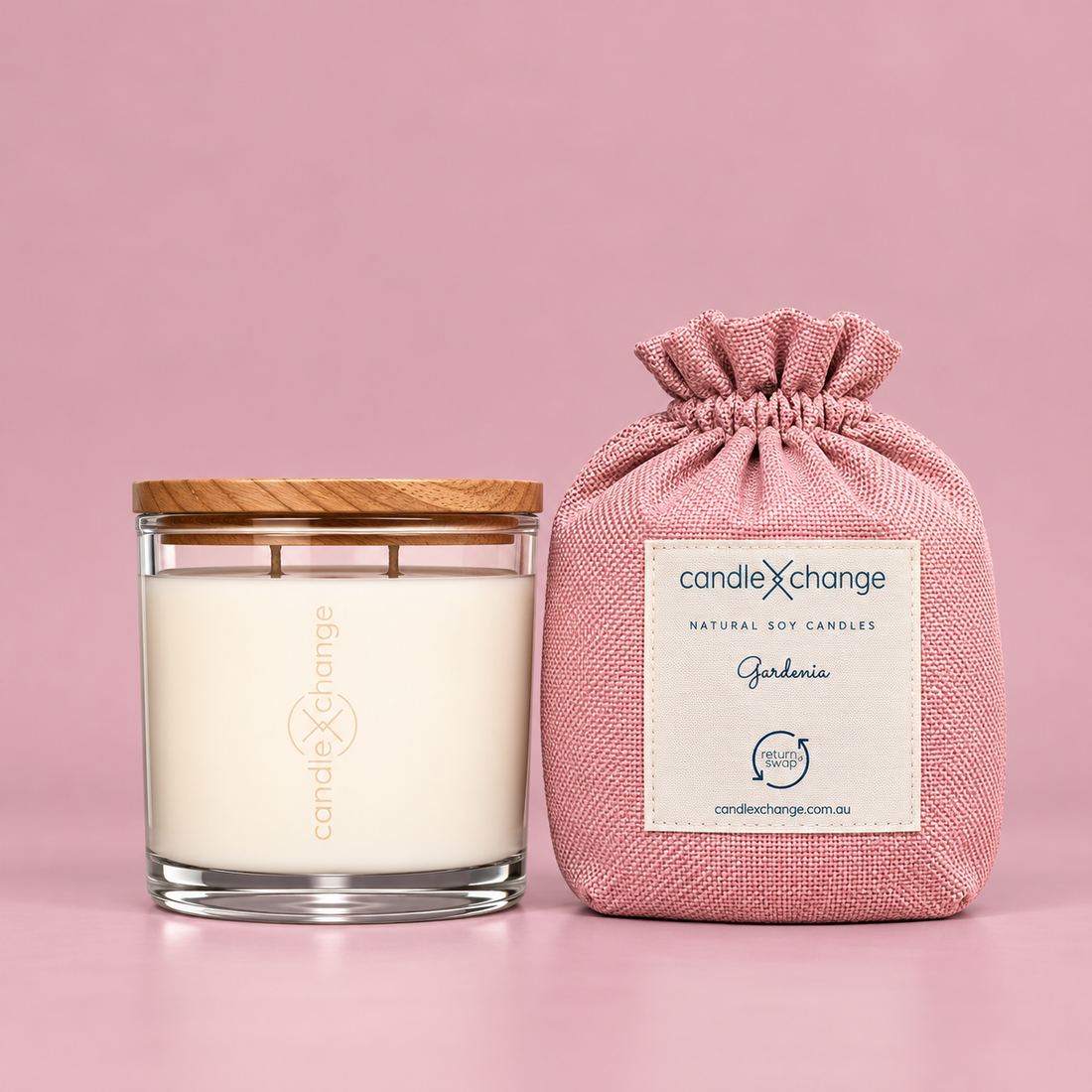 Gardenia 400g Soy Candle in a glass container with timber lid and dusty pink fabric gift bag