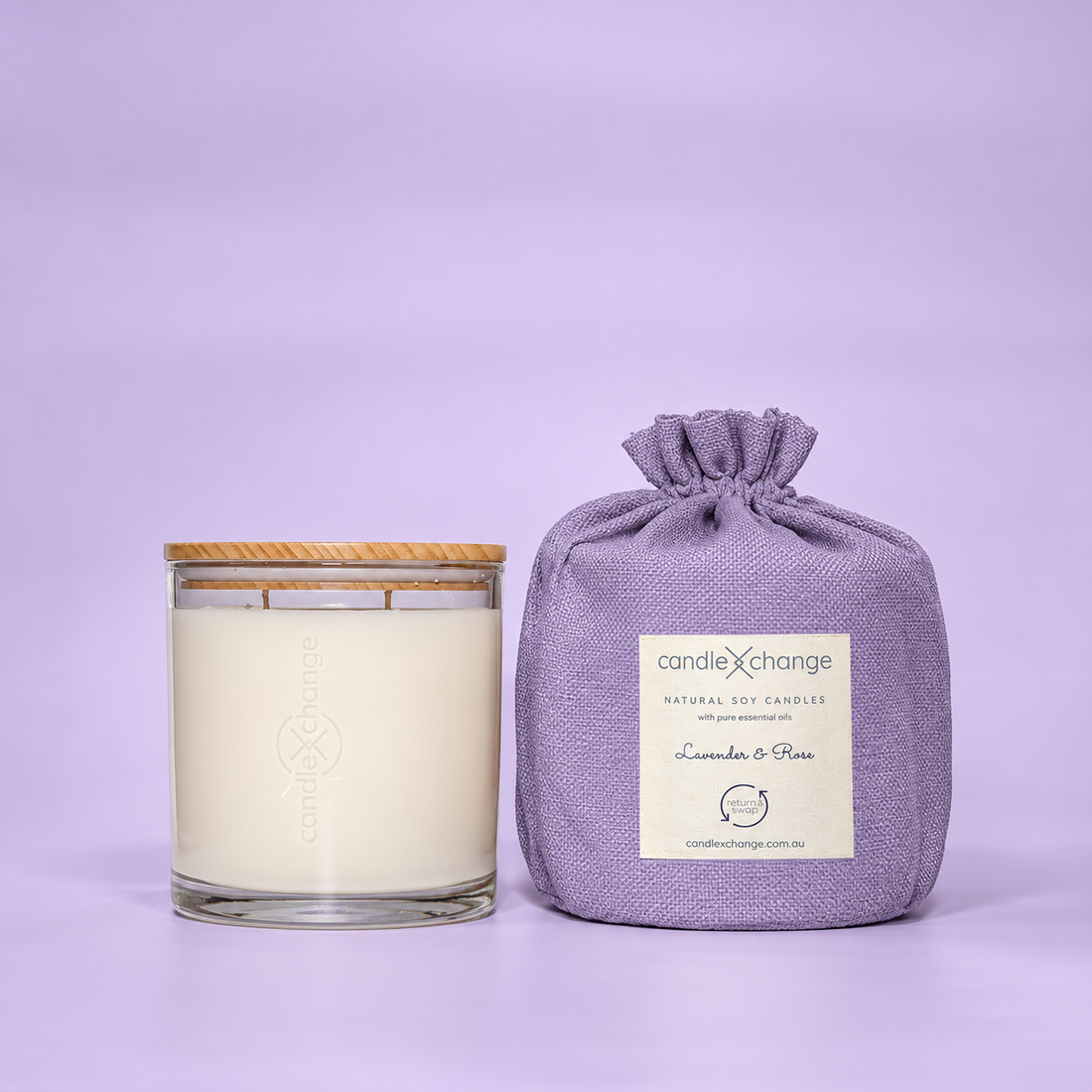 Lavender & Rose 400g Soy Candle in a glass container with timber lid and lavender purple fabric gift bag