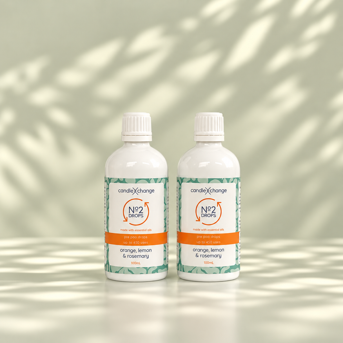 Two 100ml bottles of CandleXchange No 2 Drops, orange, lemon & rosemary