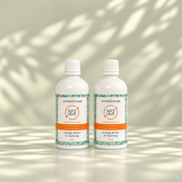 Two 100ml bottles of CandleXchange No 2 Drops, orange, lemon & rosemary